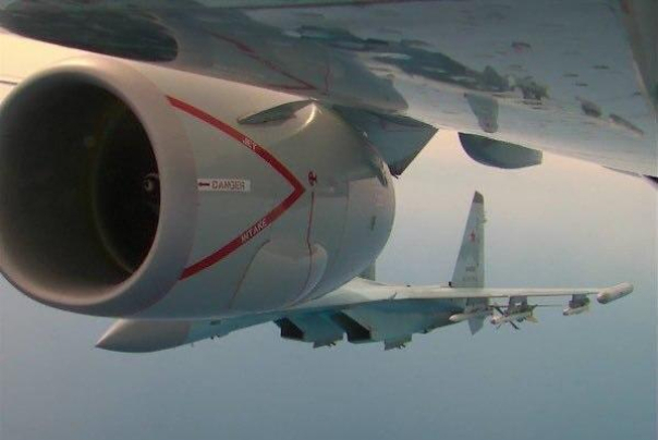 Two Russian Fighter Jets Sukhoi Su-35 Intercept US Spy Plane