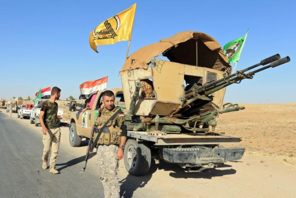 الحشد الشعبي يواصل حربه ضد داعش رغم اعتداءات امريكا