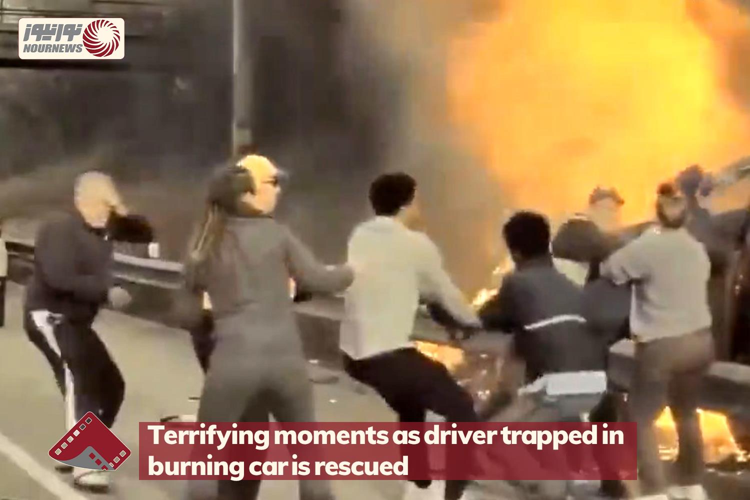 Terrifying moments as driver trapped in burning car is rescued