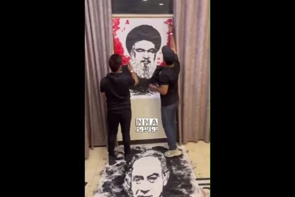 إبداع فنانين عراقيين مذهل في رسم لوحتين للشهيد السيد حسن نصر الله ونتنياهو
