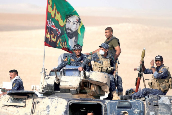 الحشد يطلق عملية لتطهير الحضر من داعش.. ويتهم امريكا بدعم التنظيم