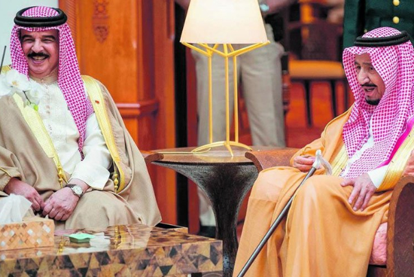 What is the purpose of Saudi Arabia and Bahrain in claiming the arrest of spies affiliated with Iran?