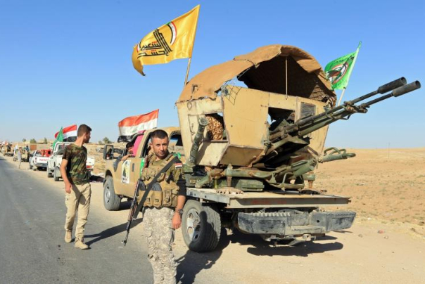 أهداف وأبعاد العدوان الامريكي على مواقع الحشد الشعبي