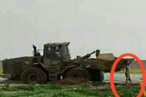تنكيل جرافات الاحتلال بجثمان شهيد بطريقة بشعة (فيديو)