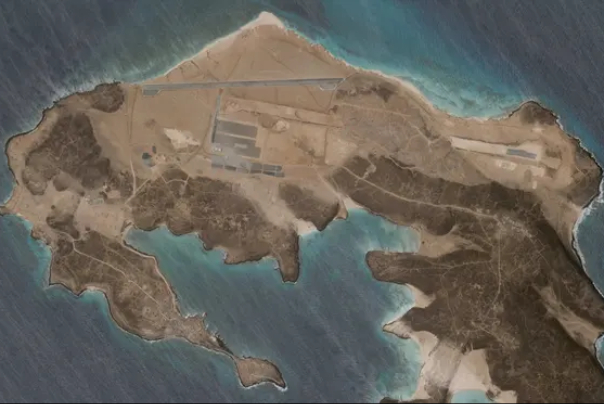 Which country has the mysterious air base in the Bab el-Mandeb Strait?