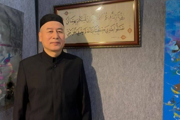 Chinese Quran activist visits Tehran expo to learn more about Tafsir works