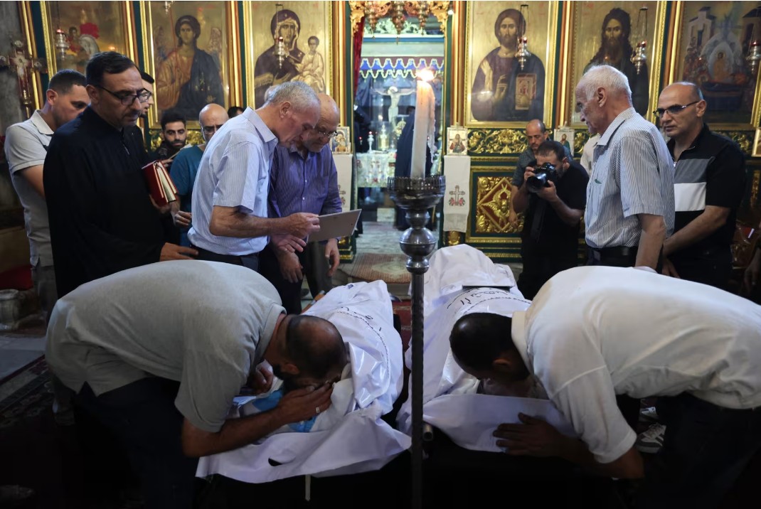 With sorrow and solidarity, Christians up pressure on Israel after deadly Gaza church strike