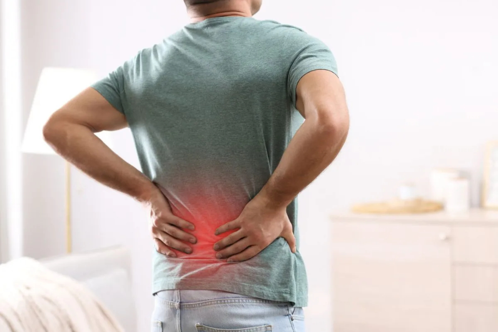 نشستن اشتباه، علت کمر درد