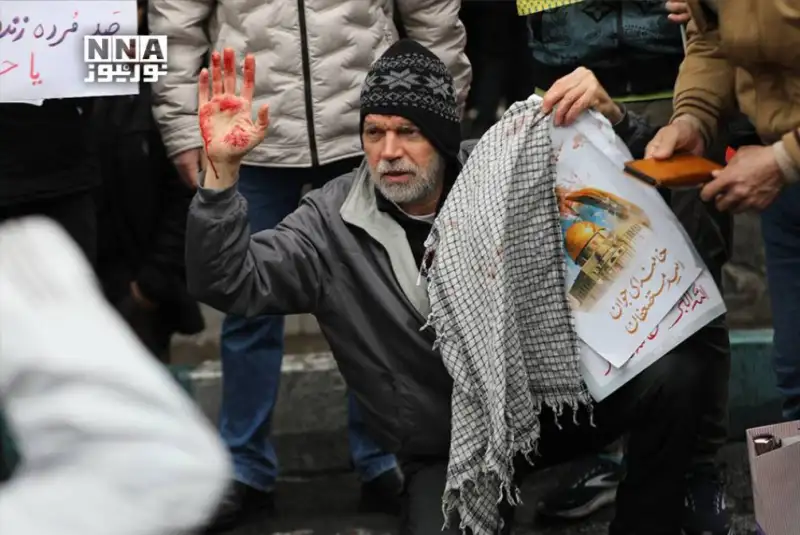 گزارش تصویری |  حمله دشمن در راهپیمایی روز قدس و شهادت یک خانم