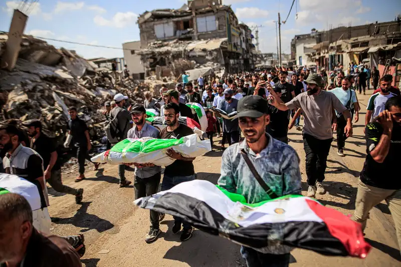 گزارش تصویری | مراسم تشییع جنازه 100 شهید فلسطینی در غزه
